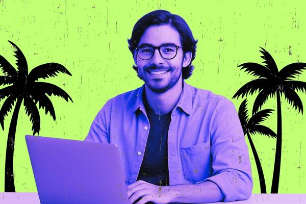Digital nomad entrepreneur at laptop representing the growing shift away from traditional office employment toward independent work