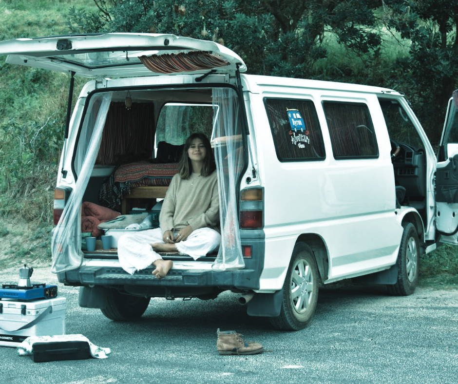 Remote financial professional working on laptop representing the top insurance and financial services careers for digital nomads